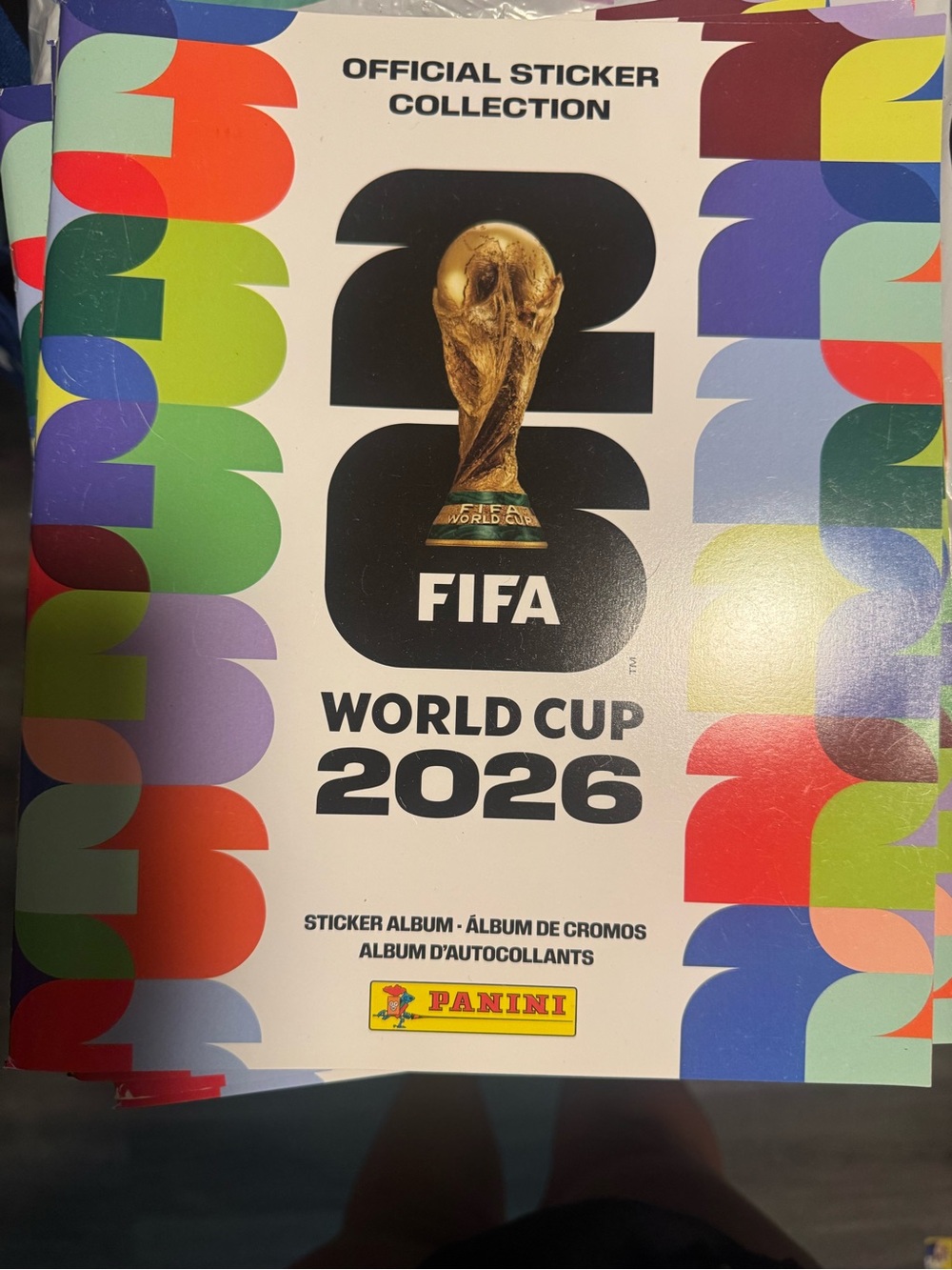 Panini We Are 26 Sticker Album - Black, Red, Green, Blue, Purple, Yellow